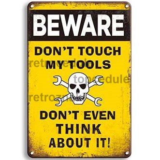 Uważaj - znak „Nie dotykaj moich narzędzi”.